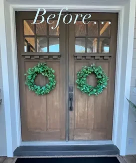 Wood double front doors with a worn, uneven finish before refinishing