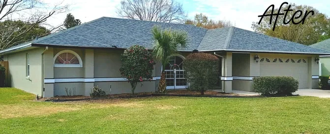 Ranch home in Lakeland repainted in sage green with white trim